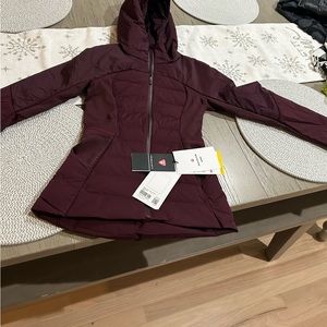 Lululemon size 0 brand new coat with tags  maroon wind proof water-resistant